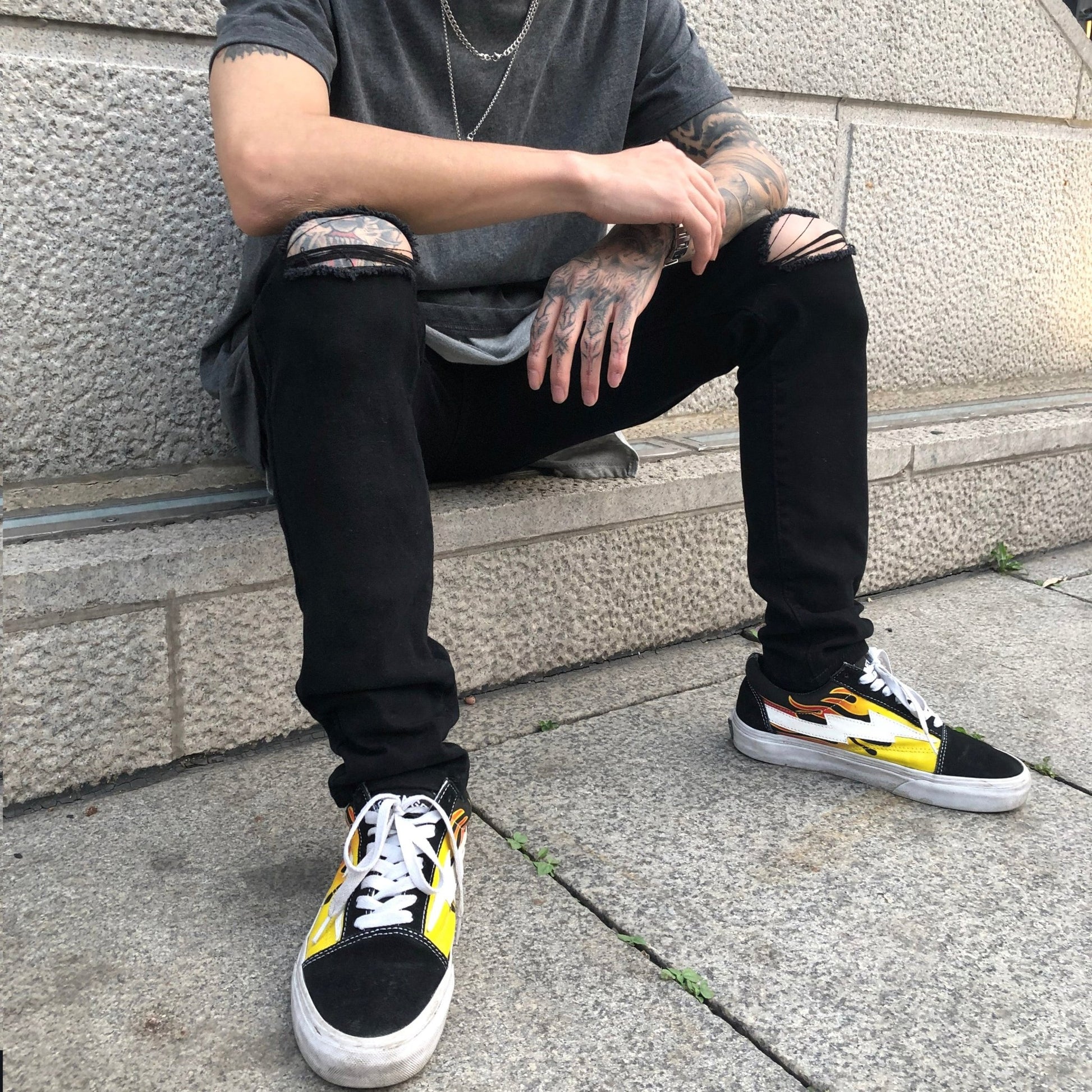Black ripped jeans - Taylor K Shop