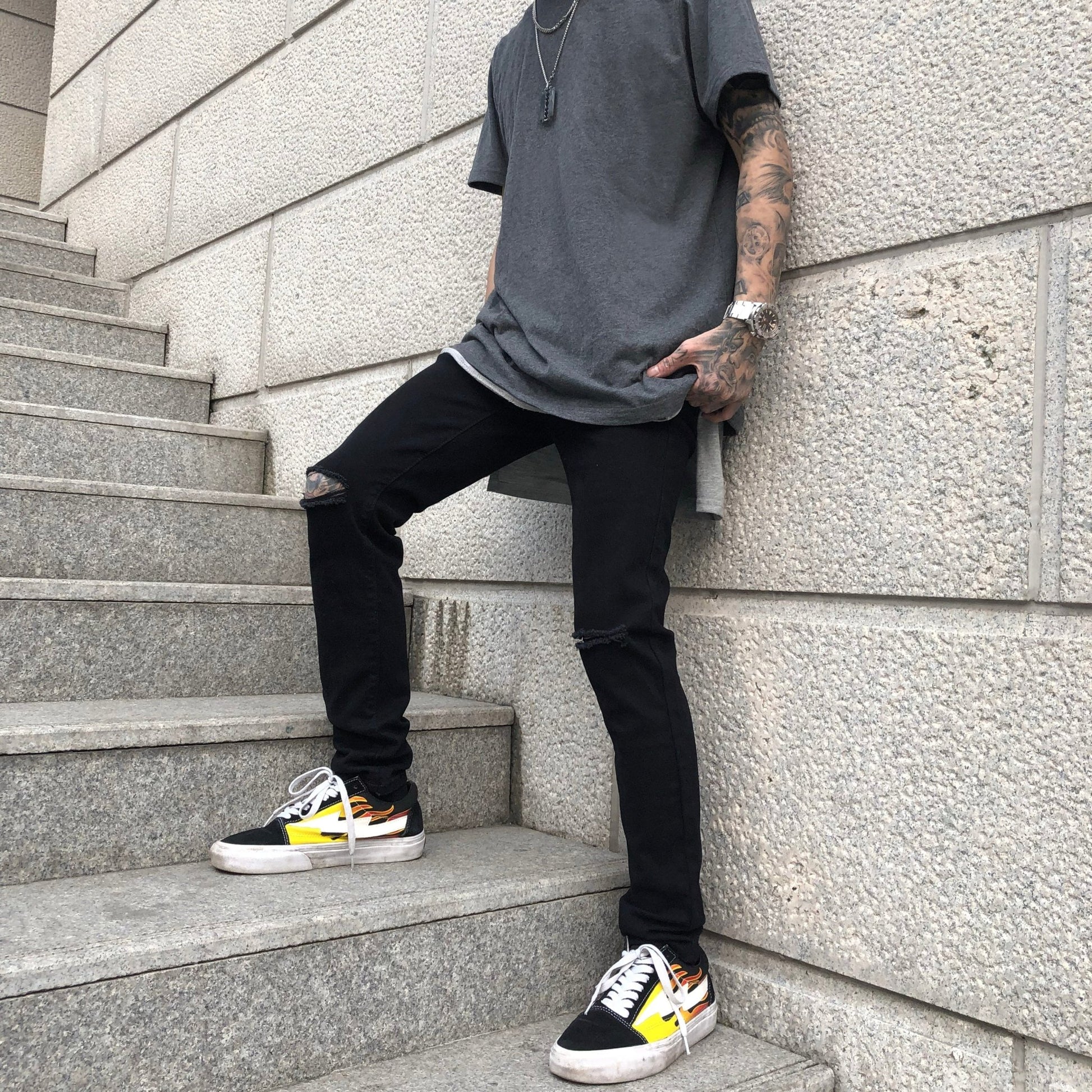 Black ripped jeans - Taylor K Shop
